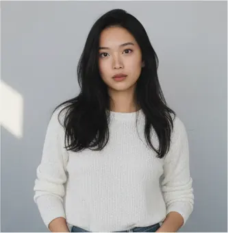 Half-body, front-facing, head level, eyes looking at the camera; arms relaxed by sides; shoulders relaxed, torso straight; eye-level camera angle, medium crop.