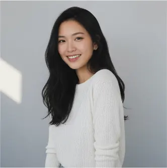 Half-body, ¾ front-facing, head slightly tilted right, eyes looking at the camera, gentle smile; arms relaxed at sides; shoulders relaxed, torso upright; eye-level camera angle, medium crop.